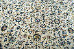 Central medallion detail of 2000s Kashan rug from Iran / Persia