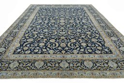 Surface texture of 2000s Kashan rug with natural Wool and intricate pattern