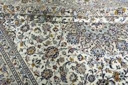 Close-up detail of New Kashan rug from Iran / Persia showing Wool weave