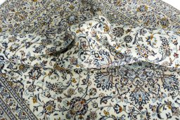 Surface texture of New Kashan rug with natural Wool and intricate pattern