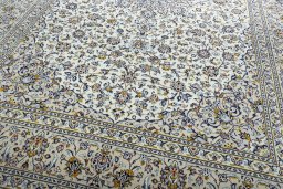 Close-up detail of New Kashan rug from Iran / Persia showing Wool weave