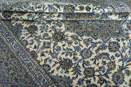 Close-up detail of 2000s Kashan rug from Iran / Persia showing Wool weave