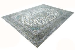 Corner detail of 2000s Kashan rug showing border pattern and Wool pile