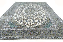 Surface texture of 2000s Kashan rug with natural Wool and intricate pattern