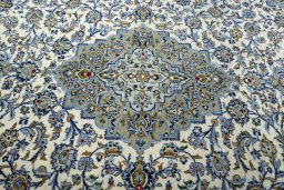 Central medallion detail of 2000s Kashan rug from Iran / Persia