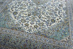 Close-up detail of 2000s Kashan rug from Iran / Persia showing Wool weave