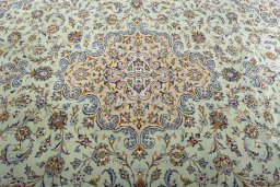 Central medallion detail of 2000s Kashan rug from Iran / Persia