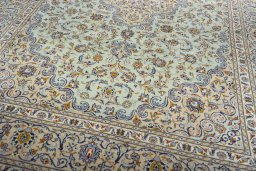Close-up detail of 2000s Kashan rug from Iran / Persia showing Wool weave