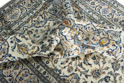 Surface texture of New Kashan rug with natural Wool and intricate pattern