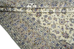 Close-up detail of New Kashan rug from Iran / Persia showing Wool weave
