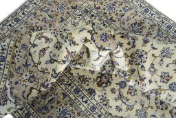 Surface texture of New Kashan rug with natural Wool and intricate pattern