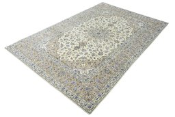Corner detail of New Kashan rug showing border pattern and Wool pile