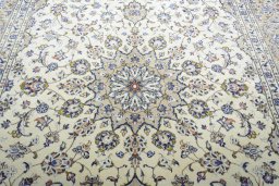 Central medallion detail of New Kashan rug from Iran / Persia