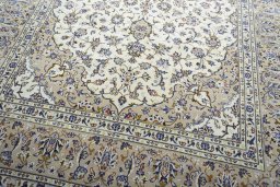 Close-up detail of New Kashan rug from Iran / Persia showing Wool weave