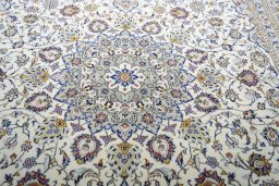 Central medallion detail of 2000s Kashan rug from Iran / Persia