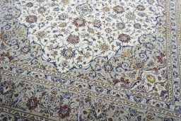 Close-up detail of 2000s Kashan rug from Iran / Persia showing Wool weave