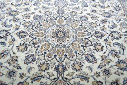Central medallion detail of 2000s Kashan rug from Iran / Persia