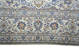 Full view of 2000s Kashan rug from Iran / Persia, 355 × 241 cm in Beige tones