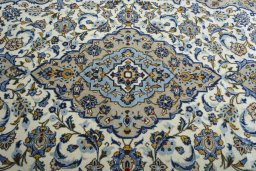Central medallion detail of 2000s Kashan rug from Iran / Persia