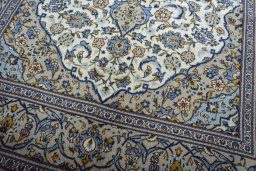 Close-up detail of 2000s Kashan rug from Iran / Persia showing Wool weave