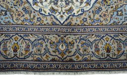 Full view of 2000s Kashan rug from Iran / Persia, 300 × 191 cm in Beige tones