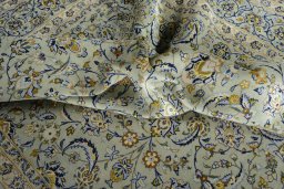 Surface texture of 2000s Kashan rug with natural Wool and intricate pattern