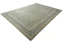 Corner detail of 2000s Kashan rug showing border pattern and Wool pile