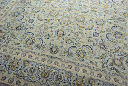 Close-up detail of 2000s Kashan rug from Iran / Persia showing Wool weave