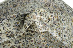Surface texture of 2000s Kashan rug with natural Wool and intricate pattern