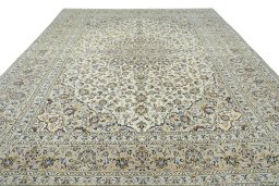 Surface texture of 2000s Kashan rug with natural Wool and intricate pattern