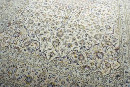 Close-up detail of 2000s Kashan rug from Iran / Persia showing Wool weave