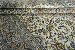 Close-up detail of 2000s Kashan rug from Iran / Persia showing Wool weave