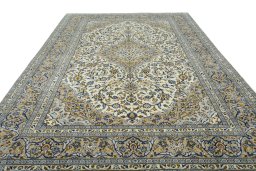 Surface texture of 2000s Kashan rug with natural Wool and intricate pattern
