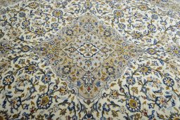 Central medallion detail of 2000s Kashan rug from Iran / Persia