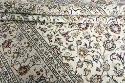 Close-up detail of 2000s Kashan rug from Iran / Persia showing Wool weave