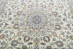 Central medallion detail of 2000s Kashan rug from Iran / Persia