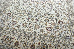 Close-up detail of 2000s Kashan rug from Iran / Persia showing Wool weave