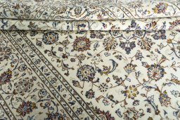 Close-up detail of 2000s Kashan rug from Iran / Persia showing Wool weave