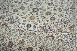 Close-up detail of 2000s Kashan rug from Iran / Persia showing Wool weave