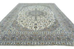 Surface texture of 2000s Kashan rug with natural Wool and intricate pattern