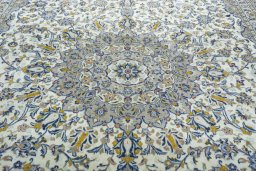 Central medallion detail of 2000s Kashan rug from Iran / Persia