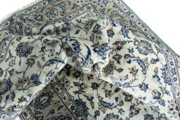 Surface texture of 2000s Kashan rug with natural Wool and intricate pattern
