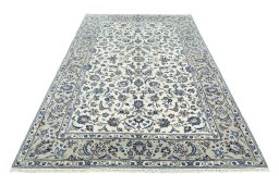Surface texture of 2000s Kashan rug with natural Wool and intricate pattern