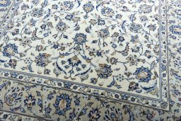 Close-up detail of 2000s Kashan rug from Iran / Persia showing Wool weave
