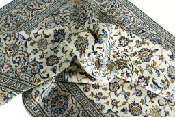 Surface texture of New Kashan rug with natural Wool and intricate pattern