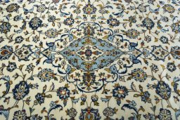 Central medallion detail of New Kashan rug from Iran / Persia