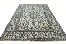 Surface texture of 2000s Kashan rug with natural Wool and intricate pattern