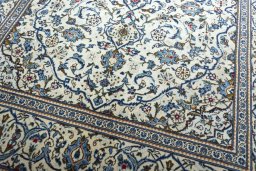 Central medallion detail of 2000s Kashan rug from Iran / Persia