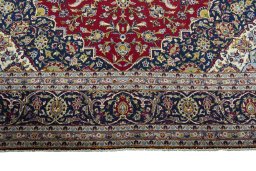 Full view of New Kashan rug from Iran / Persia, 365 × 245 cm in Red tones