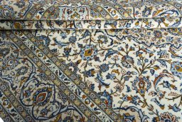 Close-up detail of 2000s Kashan rug from Iran / Persia showing Wool weave
